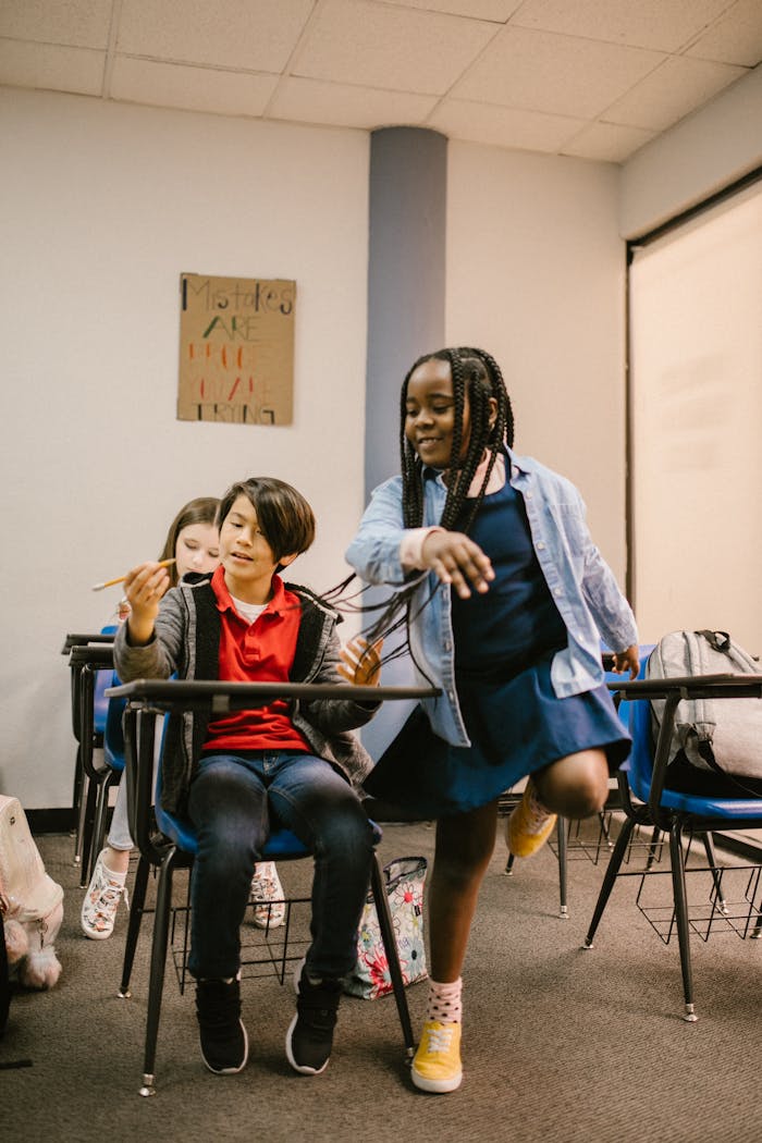 Children in a classroom highlight bullying issues, promoting awareness and kindness.